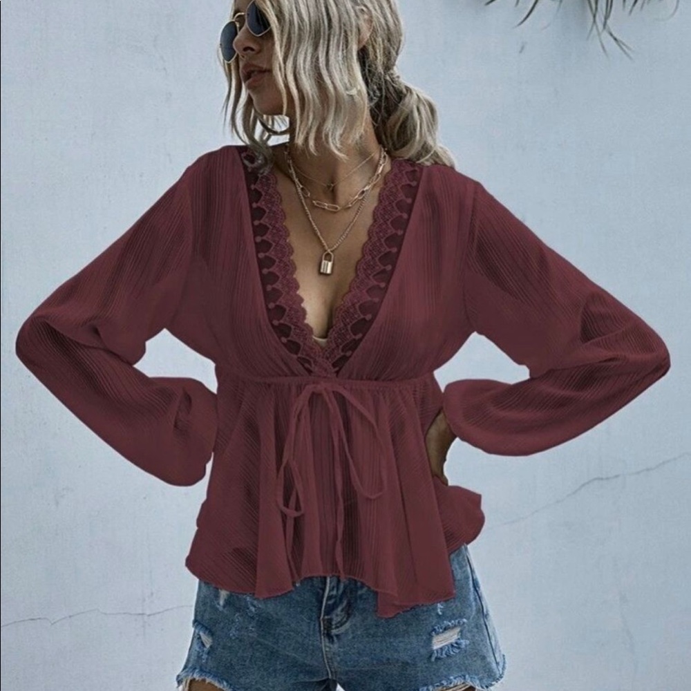 Plunging lace trim self tie peplum top